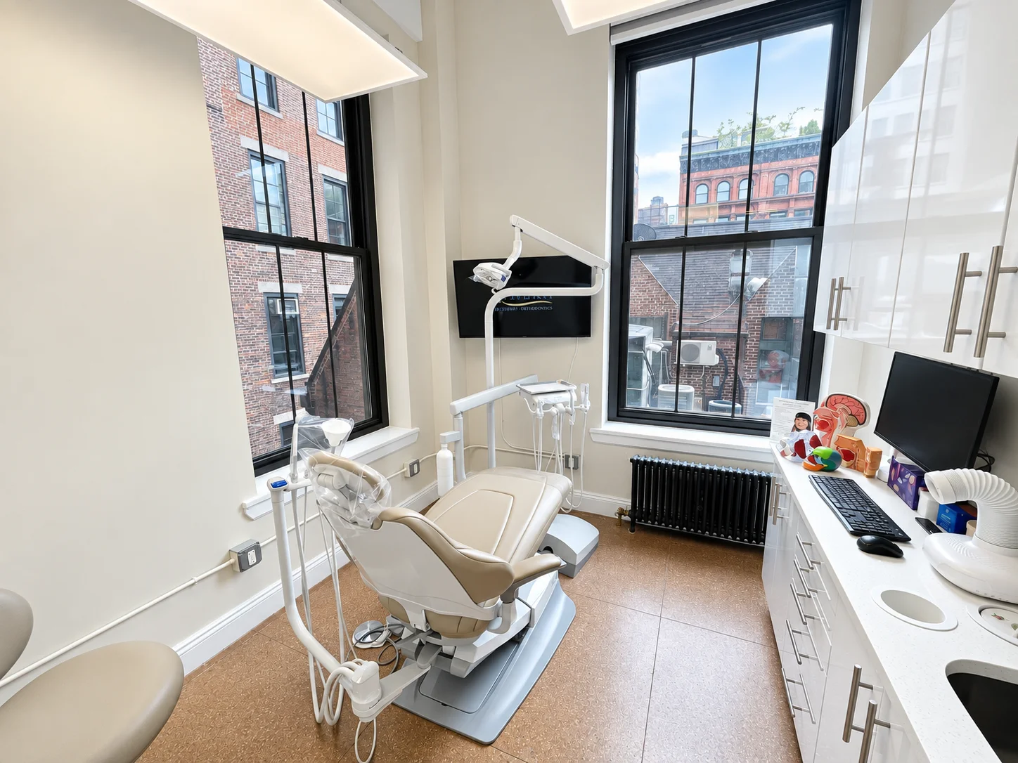 Bright treatment room with large windows